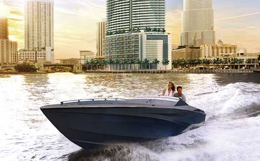 Couple in boat in the bay outside Kimpton EPIC Hotel
