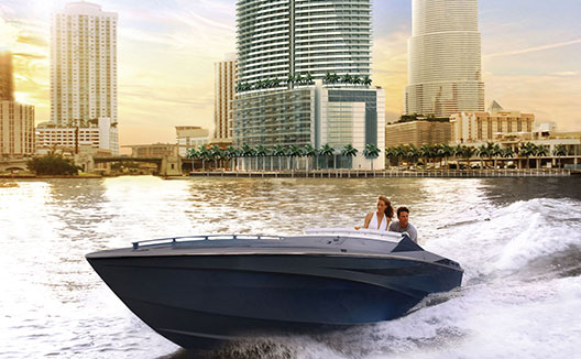 Couple in boat in the bay outside Kimpton EPIC Hotel